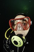 Scuba diver is watching a Craspedacusta sowerbii, freshwater jellyfish, phylum Cnidaria, invasive species. Lugano lake, Ticino, Switzerland