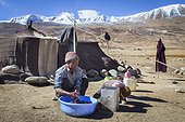 Man washing his clothes in a camp, Surroundings of Korzok, Leh, Ladakh, Himalayas, India