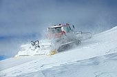 Groomer in action, Les Deux Alpes ski ressort, France