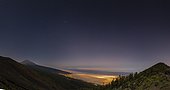 Night view of the orotava valley, the Teide volcano and the cloud layer, Tenerife, Canary Islands, Spain