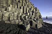 Reynisdrangar, Columnar basalt cliffs and Reynisdrangar sea stack situated under the mountain Reynisfjall near the village of Vík, southern Iceland