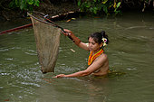 Fishing woman Mentawai Siberut island. Sumatra, Indonesia
