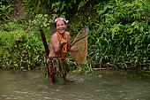 Fishing woman Mentawai Siberut island. Sumatra, Indonesia