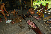 Division of the cooked pork(. Mentawai. Siberut, Indonesia