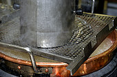 Manufacture of sweets, cooking sugar in copper pots adding glucose syrup, Confiserie des Hautes Vosges, Plainfaing, France