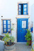 House with typical Cycladic architecture on the island of Santorini of the troglodytic type built on the volcanic cliff (caldera or caldera). Firostefani, Greece