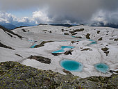 Thawing high mountains lake, Lac noir, Haute-Savoie (74), Aiguilles Rouge National Nature Reserve, Alps, France