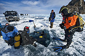 Divers before diving under the ice, Lake Baikal, Siberia, Russia