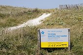 Information panel regarding a protected natural site Sainte-Marguerite Dunes in Landeda, Brittany, France