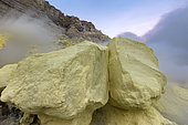 Indonesia, Java Island, East Java province, Kawah Ijen volcano, sulfur flames and rocks