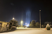 Light pillars in winter, Thyez, Alps, France. In an icy atmosphere (-7 ° C), artificial light in the town of Thyez is reflected in ice crystals suspended in the air. This phenomenon known as light pillars is common in the far north but rare in our latitudes.