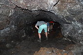 Speleological tourism, Cave of volcanic lava. Island of Pico. Azores. Portugal