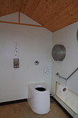 Pit toilet in ski resort, Savoie, Alps, France