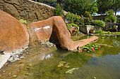 Saint Adrian Garden ponds - the Philia fountain, Philia is the Greek goddess for friendship, with stunning vegetal hair, Hérault, France