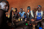 On market days in the Bana village of Kako, the mead bars do great businesses with the Bana men who come to drink liters of teji, which, though not very alcoholic, inebriate quickly. The Honey tribe, Omo valley, Ethiopia