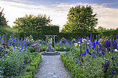 "Garden of Courtly Love" with boxwood (Buxus sp) and Delphinium (Delphinium sp) and Rose (Rosa sp) squares, Jardins du Pays d'Auge, Cambremer, Calvados, Normandie, France