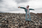 Ragmen in the Bantar Gebang landfill, In Indonesia, on the outskirts of Jakarta, lies the Bantar Gebang site, the largest open-air dump. All day, men, women and children, get what can be resold.