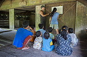 Mathematics exercise at the Sekolah Patas,an unofficial, non-governmental school, Pulau Siberut, Sumatra, Indonesia