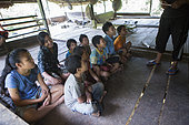 Children in Sekolah Patas, an unofficial, non-governmental school not recognized by the state, Pulau Siberut, Sumatra, Indonesia