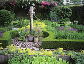 Flowered aromatics garden with water pump, Mme Deferme's garden, Belgium