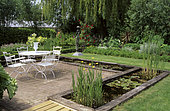 Terrace : Garden furniture surrounded by a pond, Aquatic plants, Private garden, Belgium