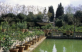 Alignment of pots planted in the spring Boboli Garden. Florence, Italy.
