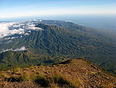 View of Batur volcano from the summit of Agung volcano, Bali island, Indonesia.
