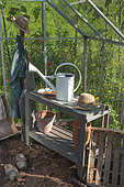 Gardener equipment in a greenhouse, summer, Moselle, France