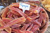 Pieces of candied papaya on a market stall, summer, Provence, France