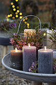 Candles on outdoor table