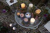 Candles on outdoor table