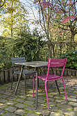 Dining area on a garden terrace, autumn, Somme, France