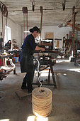 Frédérique Fert making a scourtin with coconut thread, Nyons, Provence, France