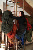 Sophie Fert carrying colored coconut threads, Nyons, Provence, France