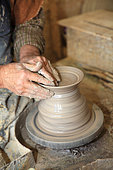 Potter working on a clay piece, Martine Gilles and Jaap Wieman, Village of Brantes, Provence, France