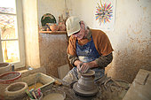Potter working on a clay piece, Martine Gilles and Jaap Wieman, Village of Brantes, Provence, France