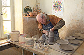 Potter working on a clay piece, Martine Gilles and Jaap Wieman, Village of Brantes, Provence, France