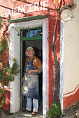 Potter in front of the door of his studio, Martine Gilles and Jaap Wieman, Village of Brantes, Provence, France
