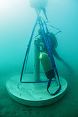 Positioning of the base of an experimental artificial micro reef (xreef) by a scuba diver, Marine Protected Area of the Agathoise coast, Hérault, France