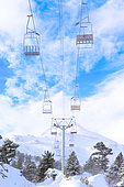 Snowy landscape and chairlifts, ski resorts and winter sports in mountain areas, Station Pierre Saint Martin, municipality of Arette (64), Pyrenees, France