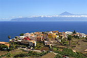 Village of Agulo with the Teide (Tenerife) in the background, Island of La Gomera, Canary Islands.