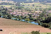 Lot Valley, village of Granges-sur-Lot below Laparade, overlooking the fruit-tree fields, Lot-et-Garonne, Aquitaine, France