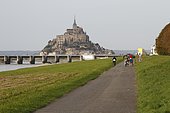 Tourist trail along the Couesnon river in front of Mont Saint-Michel, Normandy, France