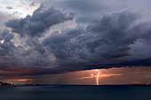 Lightning strike under a cumulonimbus over Lake Geneva, near Thonon-les-Bains, Haute-Savoie, France, on the evening of May 13, 2017.