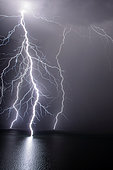 Branched lightning on Lake Geneva, during the stormy degradation of May 13, 2017, Haute-Savoie, France / Switzerland