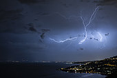 Lightning strike over Lausanne and Lake Geneva, Switzerland, June 5, 2018