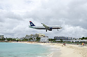 Airliner landing at Saint Martin airport, West Indies