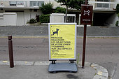 Information board on dog excrement in urban areas in Versailles, Ile-de-France, France
