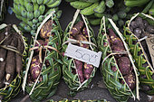 Baskets of sweet potato (Ipomea batatas) on the market of Port Vila, Efate Island. Vanuatu.