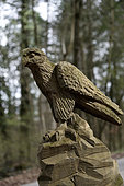 Raptor sculpture, trails of Faines and Enchanted Forest, wooden sculpture, forest, Boncourt, canton of Jura, Switzerland